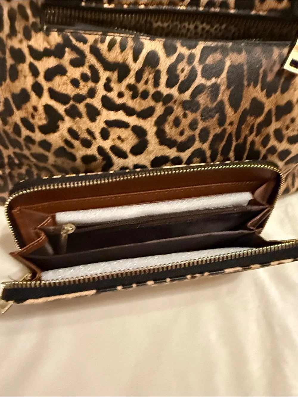 Leopard Print Tote Bag with Black Handles and Gold Hardware. The wallet included